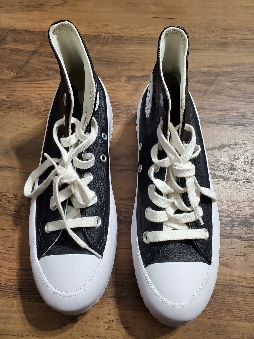 Converse White High-Top Sneakers with Black Stitching